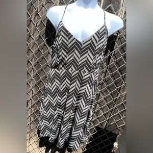 Comfortable summer dress. Very casual and stretchy. 95% polyester 5% spandex